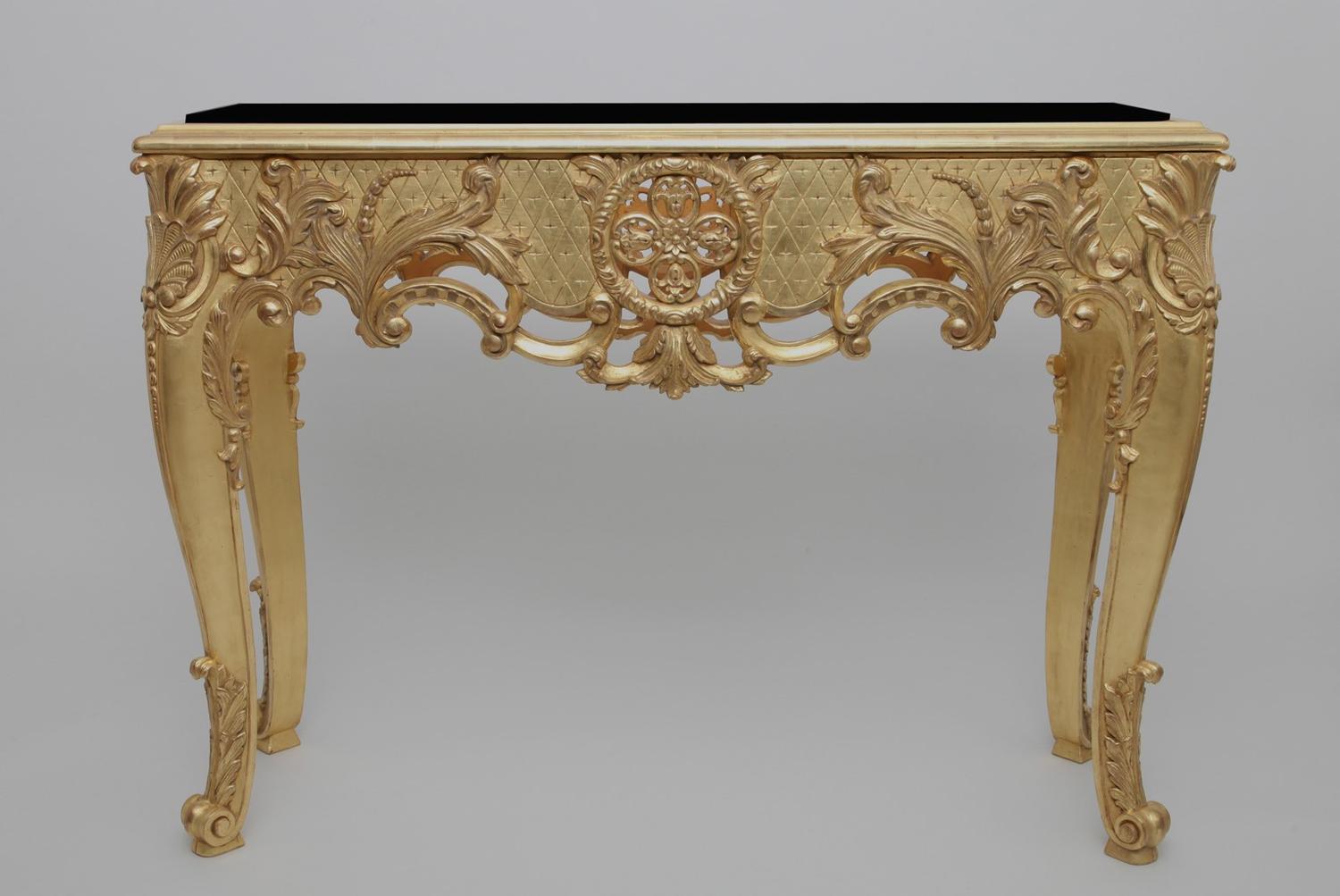 Gold console with black tray